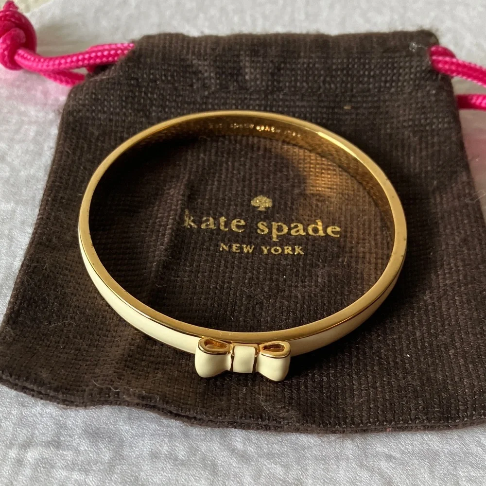 Kate Spade: “Take a Bow” Cream & Gold Tone Bow Bracelet & Dust Bag - Picture 6 of 11